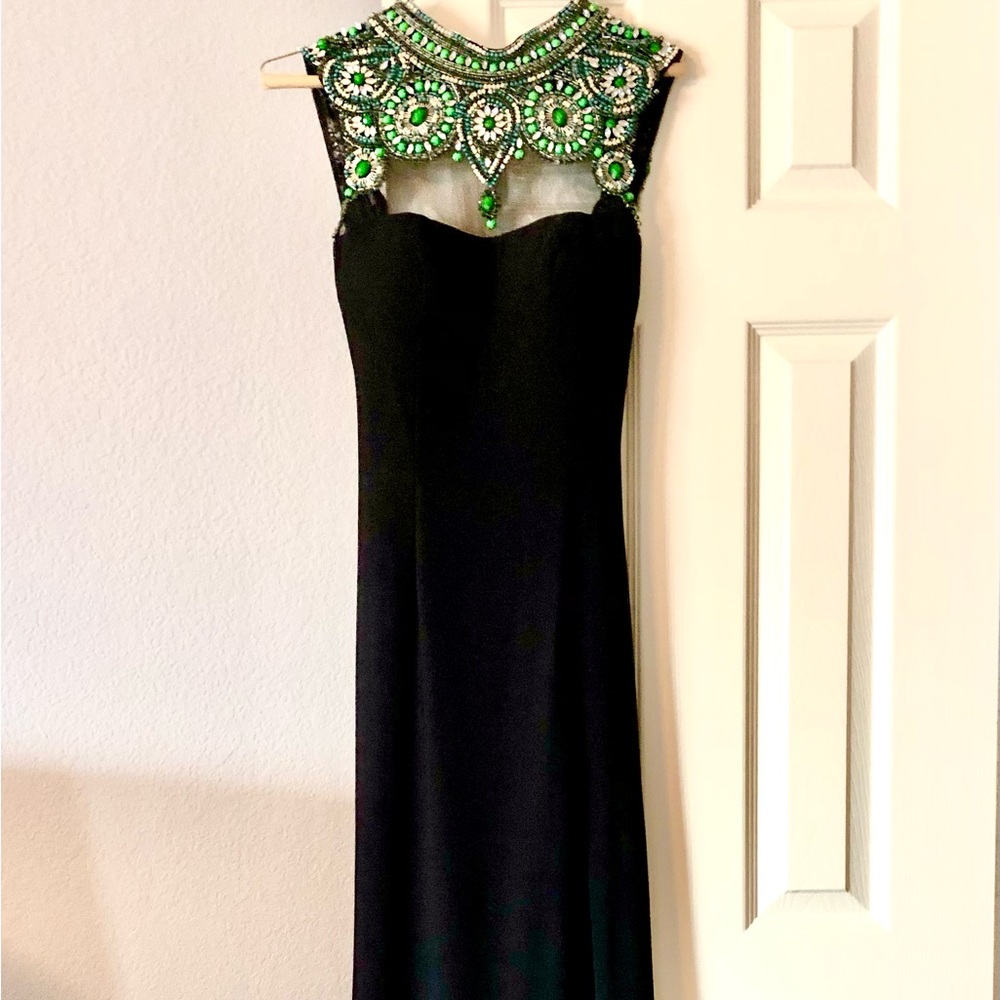 Terry Costa size 4 beaded, sleeveless, full length gown with plunging back.